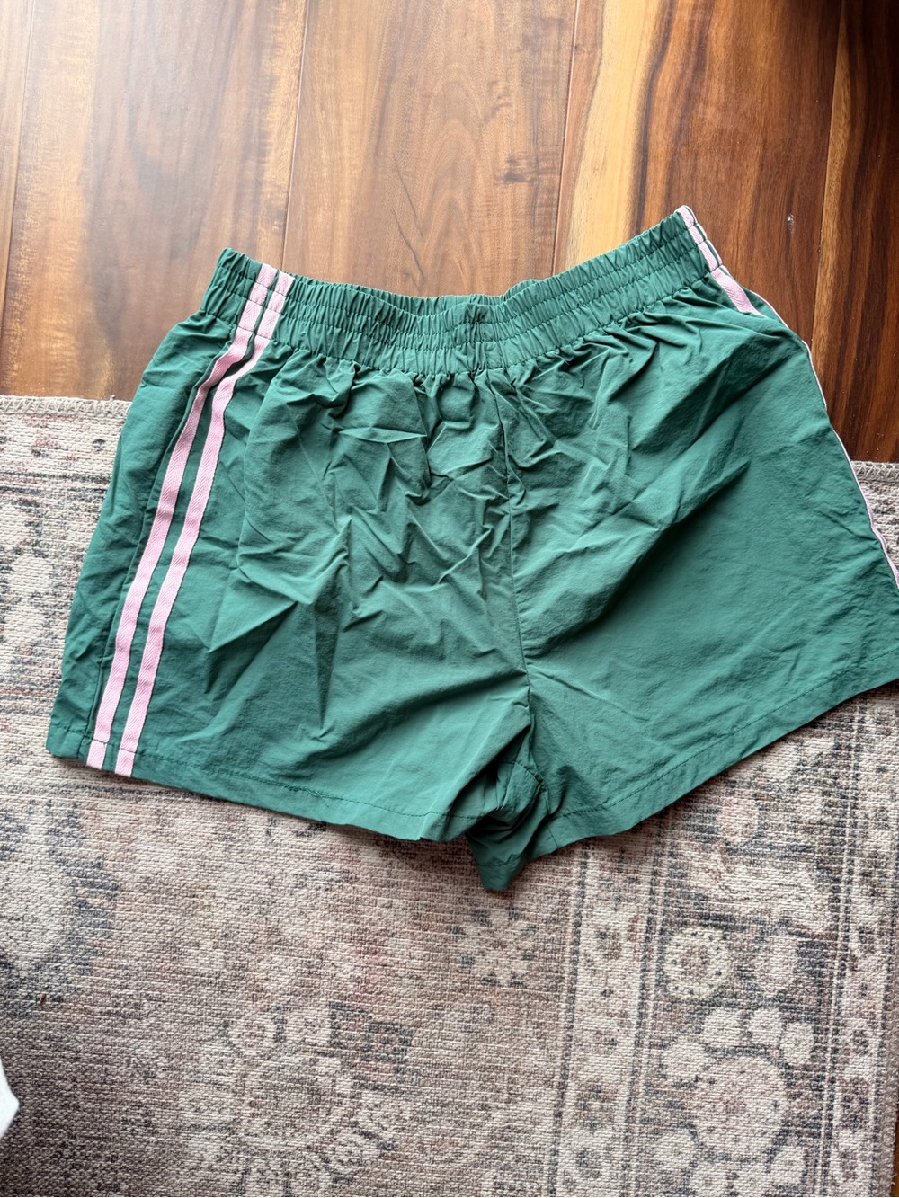 Green Athletic Shorts with Pink Side Stripes